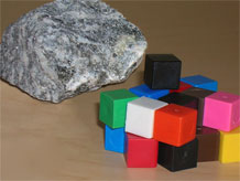 Rock with cube replica